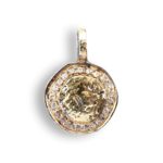 By Birdie hänge Freja Coin i SIlver och Guld