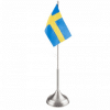Svenska flaggan på en tenn flaggstång