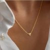 Le knot halsband i guld Drakenberg Sjölin